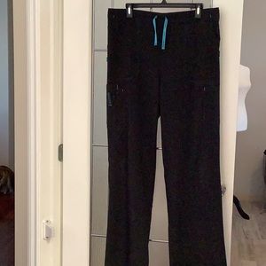 Black and blue scrub pants.